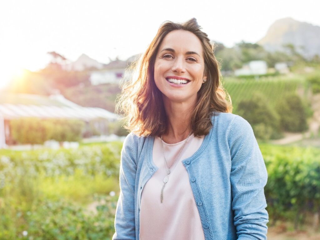 Laughing woman in park